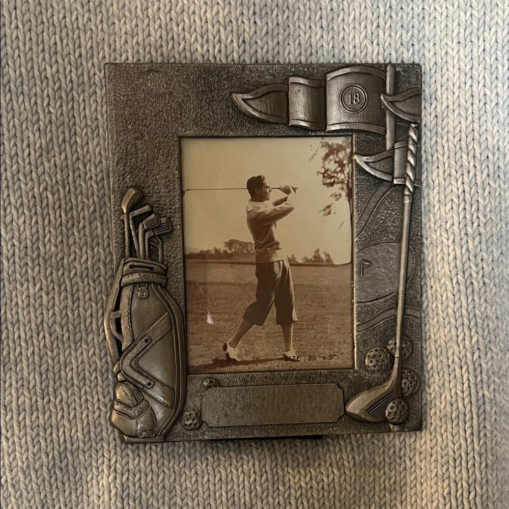 Golf Themed Metal Picture Frame with Golfer and back closures.‎  “7” x 6” frame